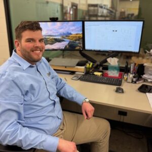 electric motor engineer helping customers
